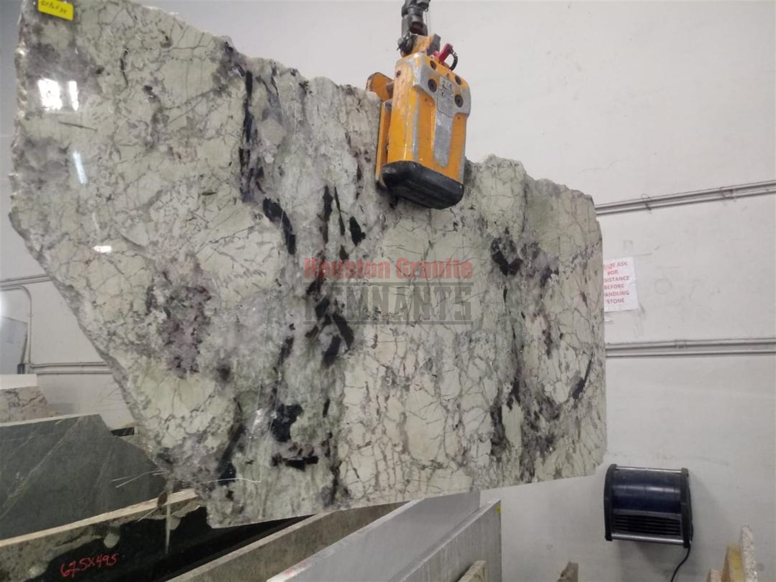 Delicatus Taupe Leathered Granite Remnant 57.5