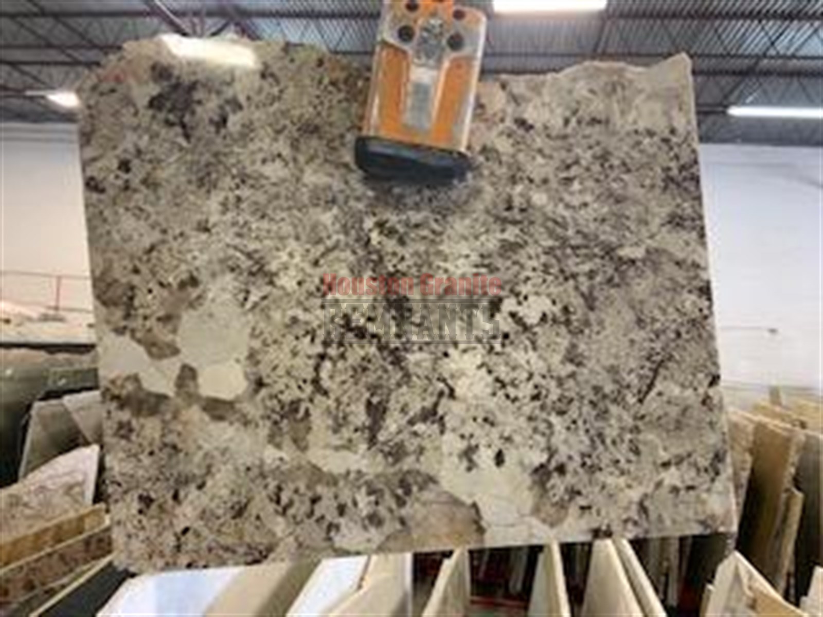 Delicatus Taupe Leathered Granite Remnant 45.5