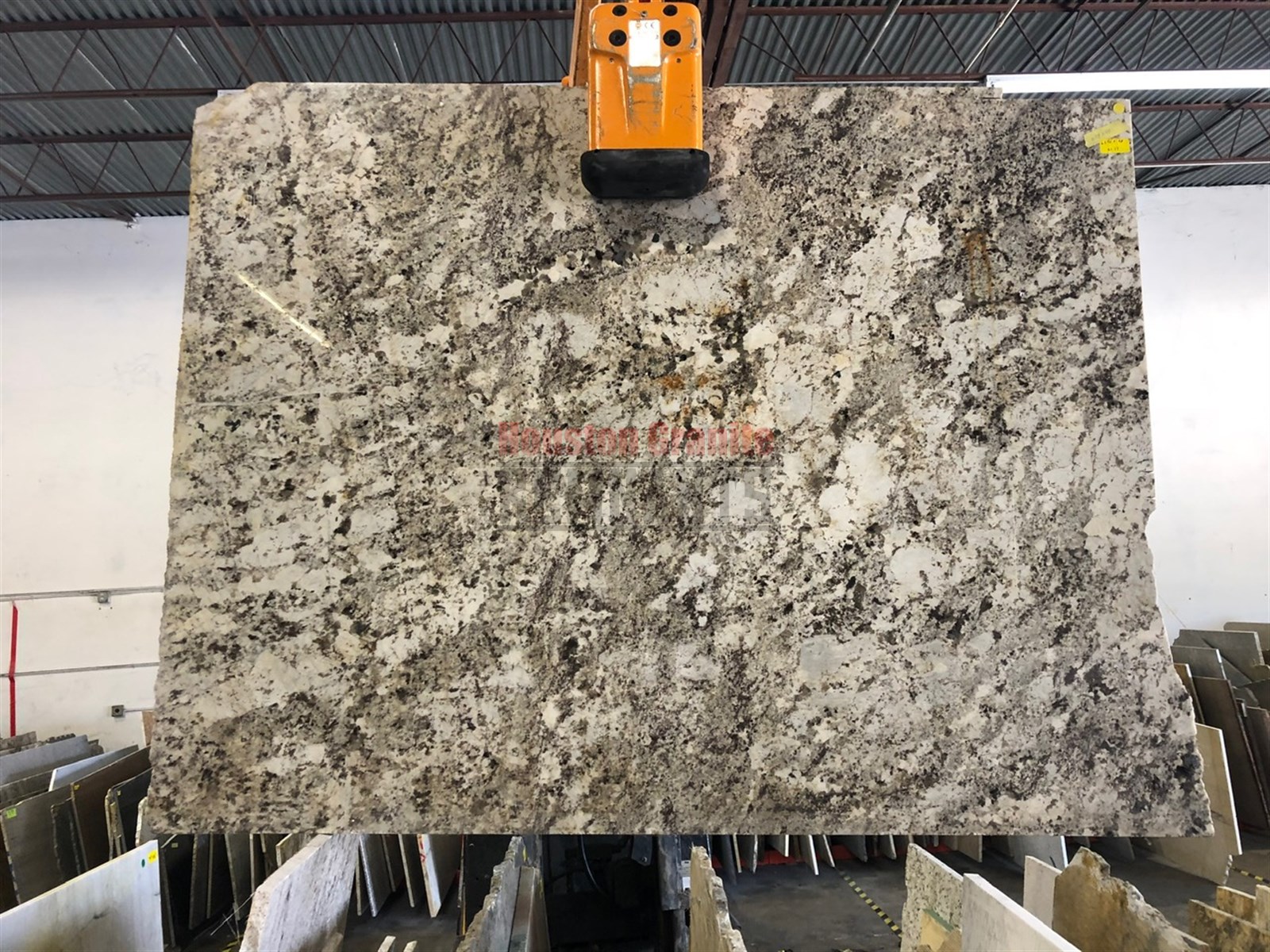 Delicatus Taupe Leathered Granite Remnant 63.5